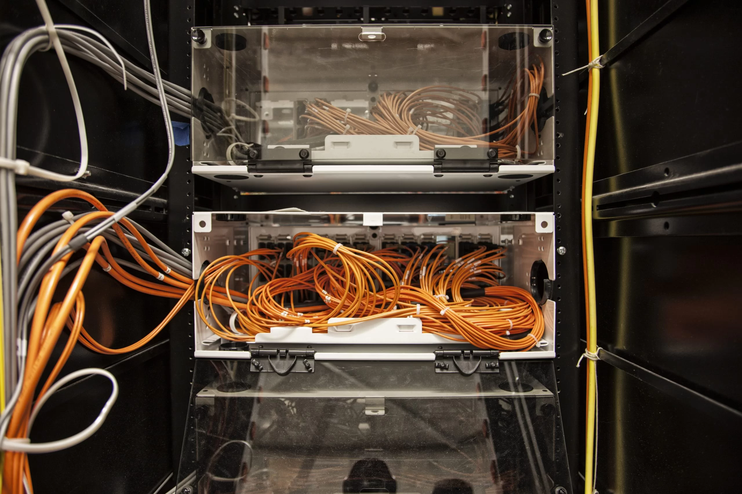 Closeup of cat 5 cable bundle system in a computer j9l4hgv scaled. Jpg