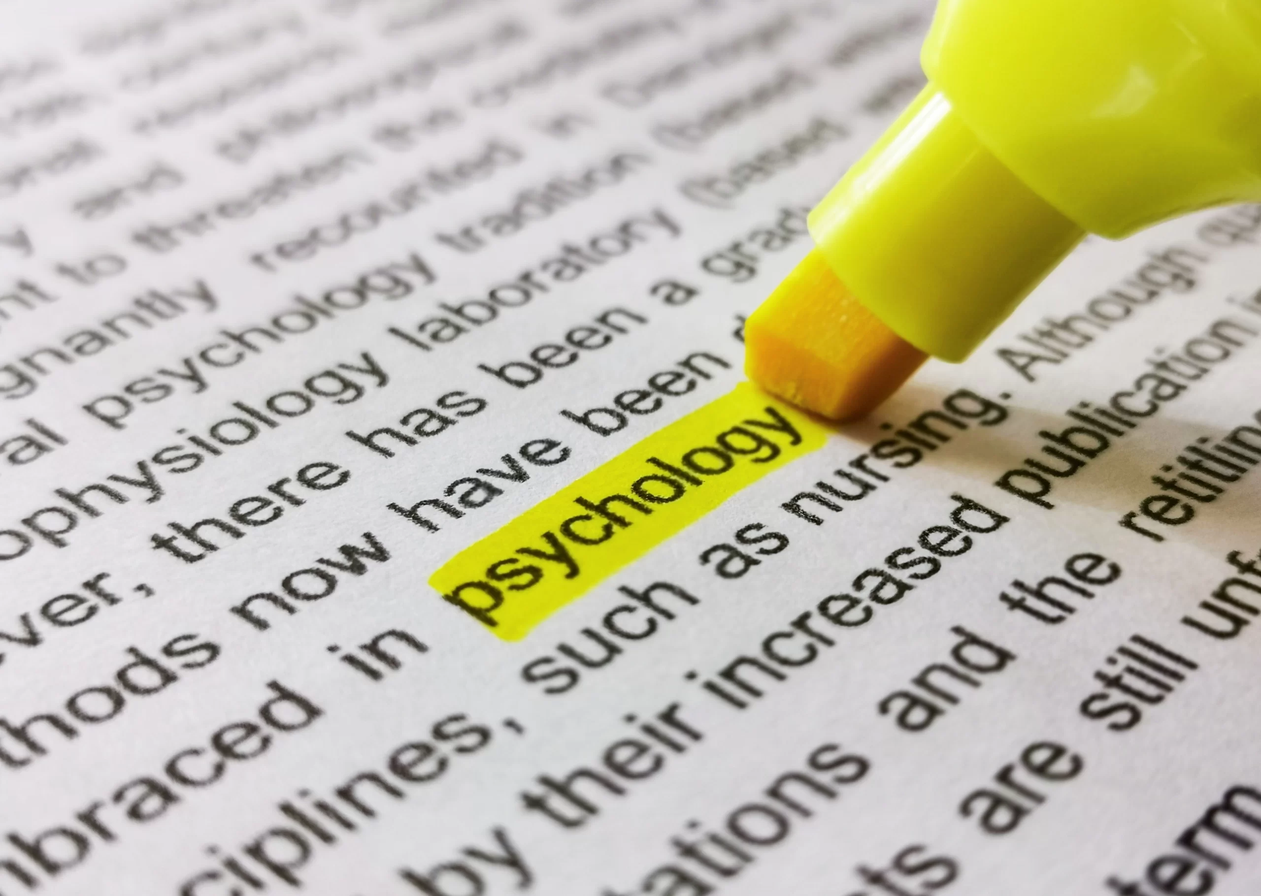 Close up image of marker highlighting word psychol nddnkxl scaled. Jpg